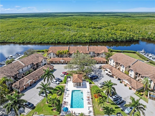 aerial view with a water view and a residential view