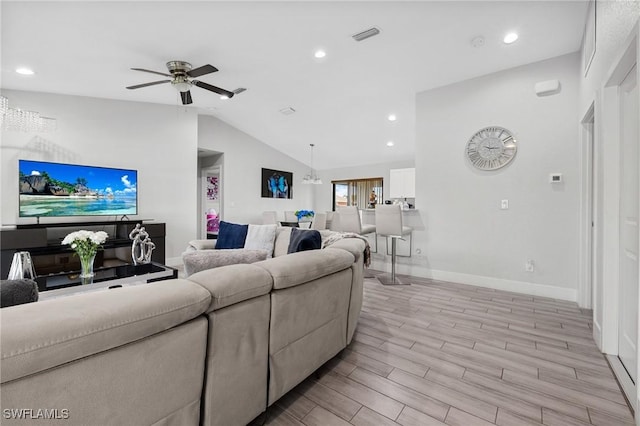 living room with recessed lighting, wood finish floors, visible vents, a ceiling fan, and vaulted ceiling