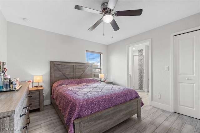 bedroom featuring wood finish floors, a ceiling fan, and baseboards