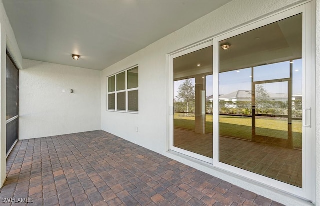 17333 Leaning Oak Trl, North Fort Myers, FL 33917 - unfurnished sunroom featuring plenty of natural light