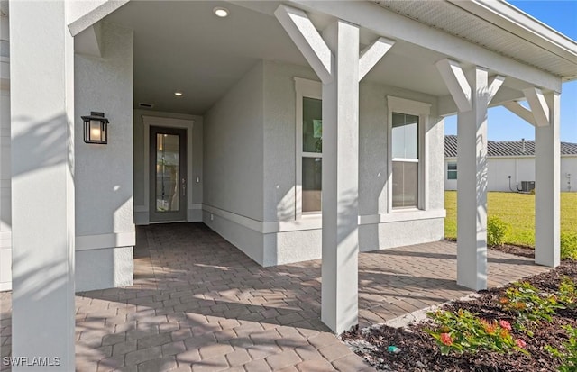 17333 Leaning Oak Trl, North Fort Myers, FL 33917 - property entrance featuring stucco siding
