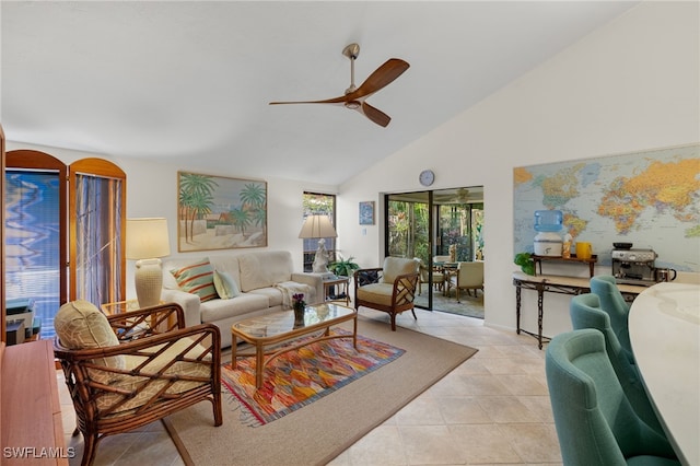 living room with light tile patterned floors, high vaulted ceiling, and a ceiling fan