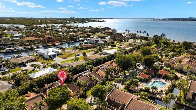 aerial view featuring a residential view and a water view