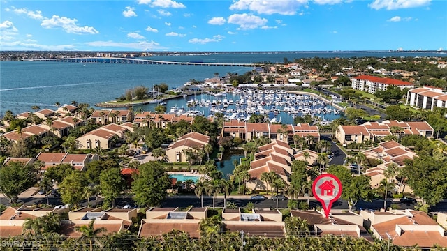 birds eye view of property featuring a water view