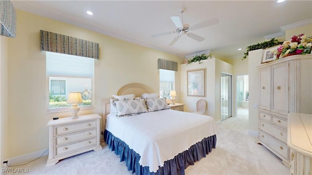 bedroom featuring a ceiling fan, baseboards, recessed lighting, ornamental molding, and light carpet