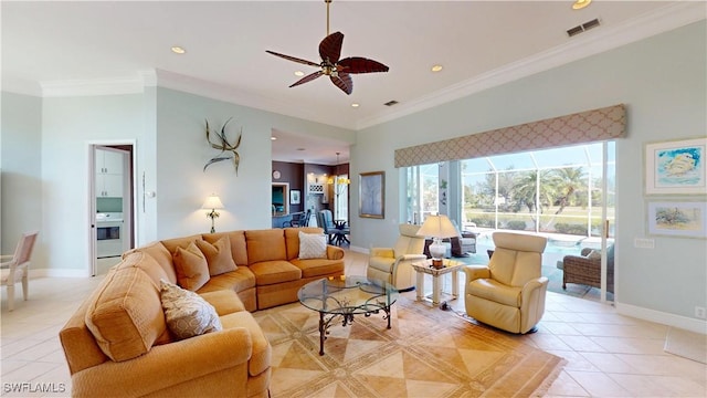 living room with light tile patterned floors, visible vents, baseboards, and ornamental molding