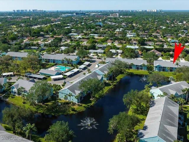 aerial view with a water view and a residential view