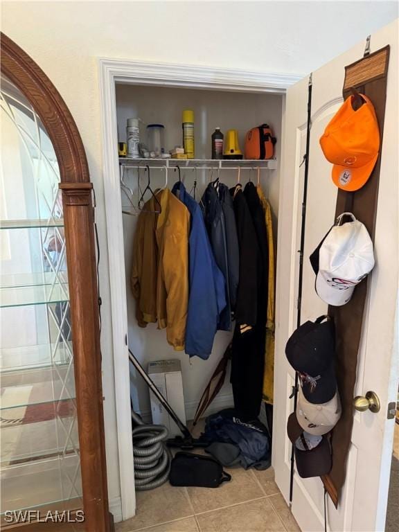 mudroom with light tile patterned floors