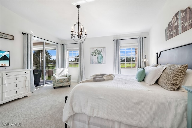 bedroom featuring access to outside, a notable chandelier, and light colored carpet