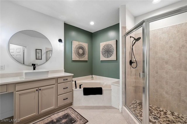 full bathroom with a garden tub, tile patterned flooring, recessed lighting, vanity, and a shower stall