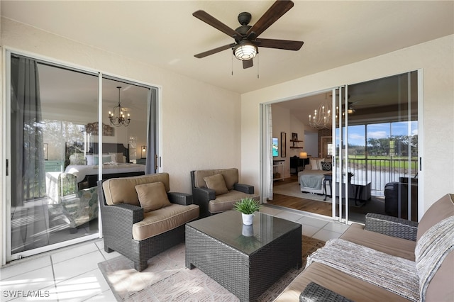 view of patio with a ceiling fan, a water view, and an outdoor hangout area