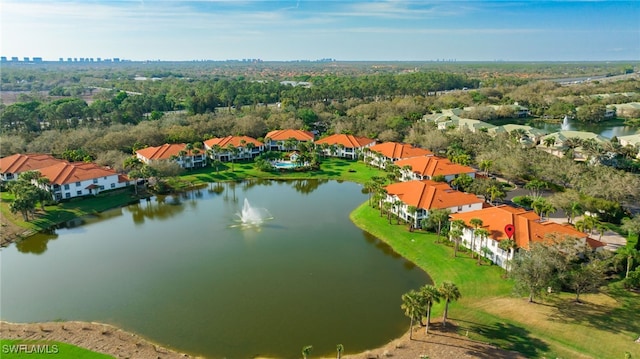 birds eye view of property with a residential view and a water view