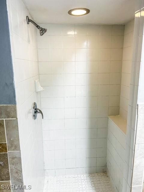 full bathroom with a shower stall