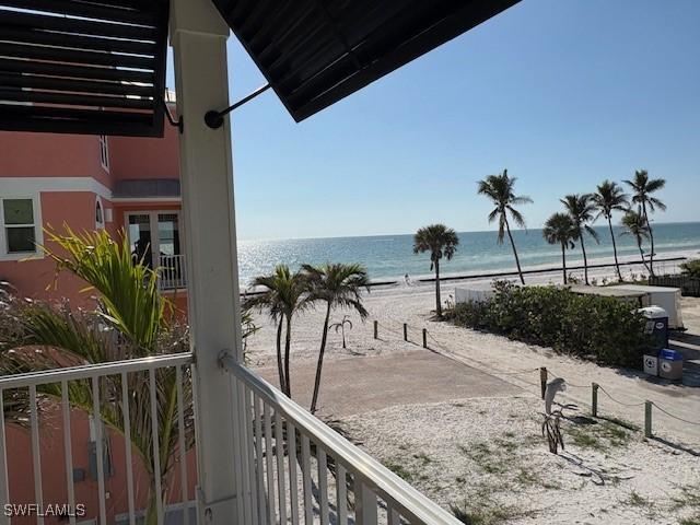 property view of water featuring a beach view