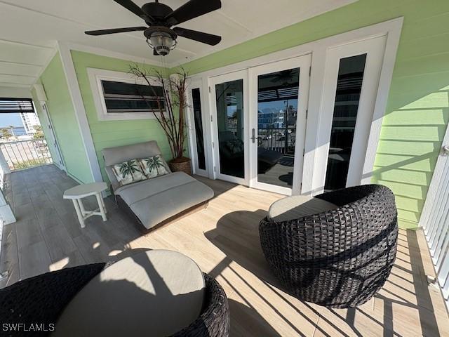 view of patio / terrace with french doors and ceiling fan