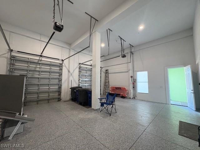 garage featuring a garage door opener