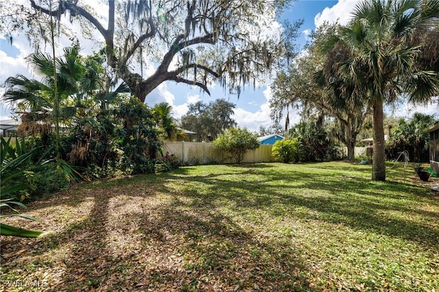 view of yard featuring fence