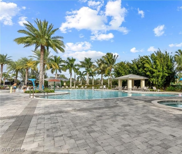 pool featuring a patio and a gazebo