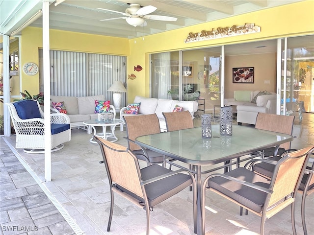 view of patio / terrace with outdoor dining area, ceiling fan, and an outdoor hangout area