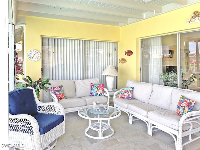 sunroom / solarium with beam ceiling