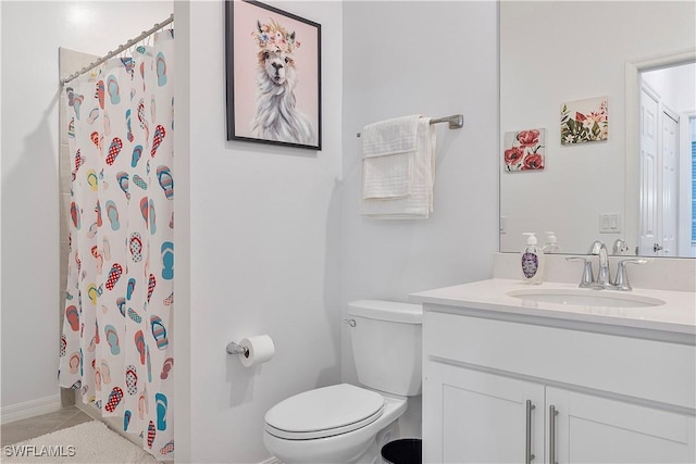 bathroom with toilet, tile patterned floors, a shower with shower curtain, and vanity