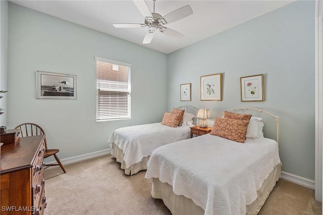 6574 Caldecott Dr, Naples, FL 34113 - bedroom featuring baseboards, a ceiling fan, and light colored carpet