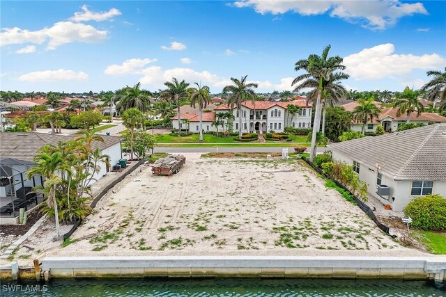372 Lamplighter Dr, Marco Island, FL 34145 - view of property's community with a residential view, uncovered parking, and a water view