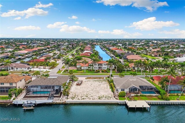372 Lamplighter Dr, Marco Island, FL 34145 - aerial perspective of suburban area with a large body of water