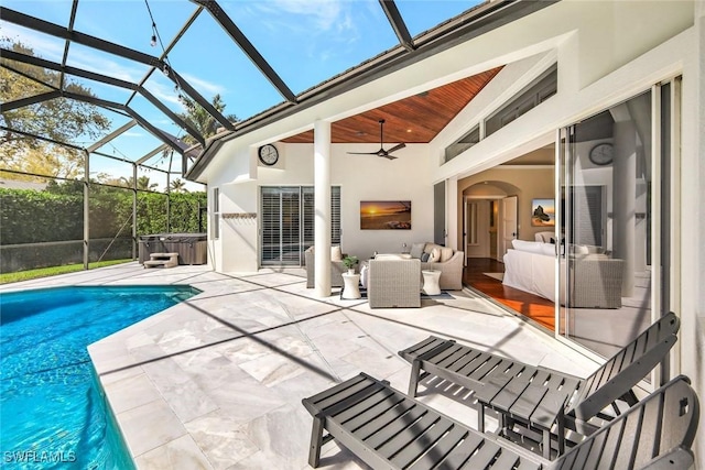 view of pool featuring a fenced in pool, an outdoor hangout area, glass enclosure, a patio area, and ceiling fan