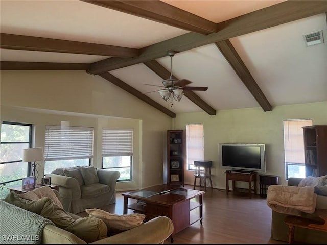 living area with visible vents, lofted ceiling with beams, a ceiling fan, and wood finished floors