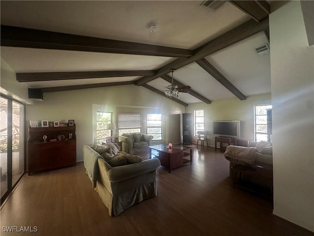 living area with a ceiling fan, lofted ceiling with beams, wood finished floors, and visible vents