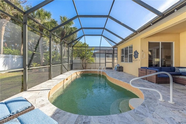 view of pool featuring a lanai, fence, an outdoor living space, a fenced in pool, and a patio area