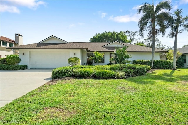 single story home with driveway, stucco siding, a garage, and a front yard