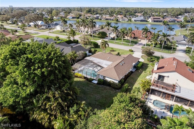 aerial view featuring a residential view and a water view