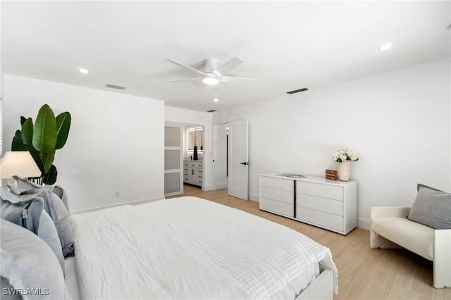 bedroom with a ceiling fan, recessed lighting, visible vents, and light wood finished floors