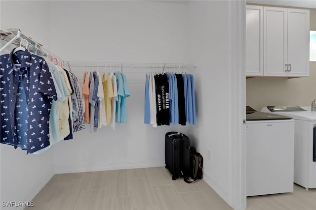 spacious closet with washer and dryer