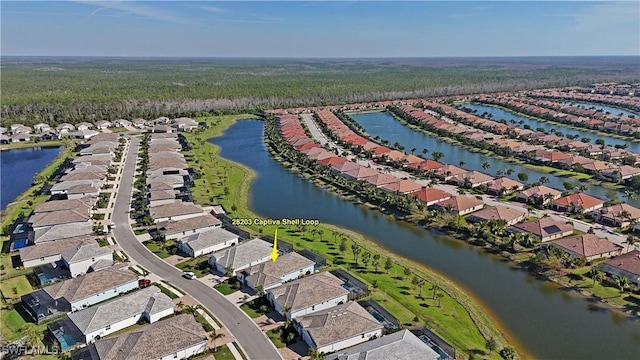 bird's eye view featuring a residential view and a water view