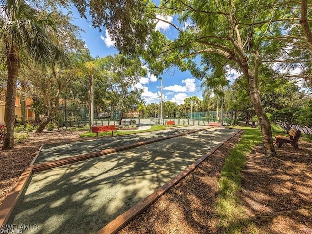 view of property's community with fence