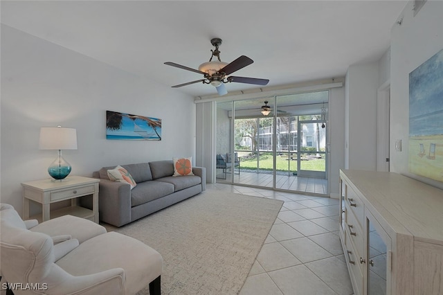 living room featuring light tile patterned floors and a sunroom