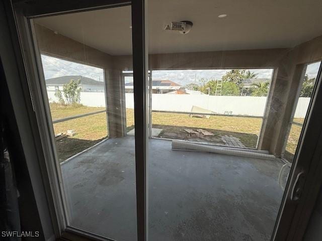 entryway with concrete floors