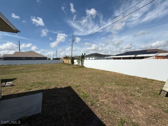 view of yard featuring fence