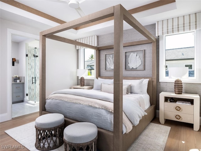 bedroom featuring light wood-style flooring and baseboards