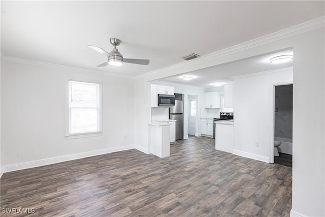 kitchen with visible vents, white cabinets, open floor plan, stainless steel appliances, and light countertops