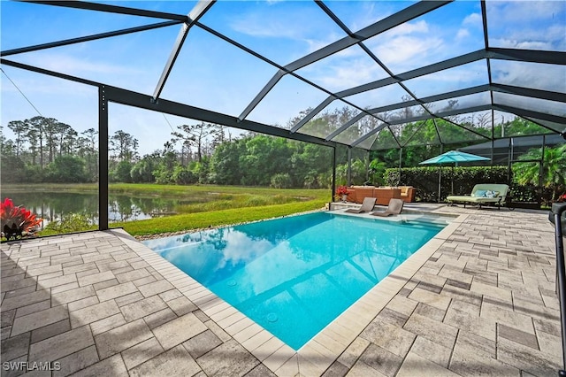 outdoor pool featuring a patio area, a water view, a lanai, and an outdoor living space