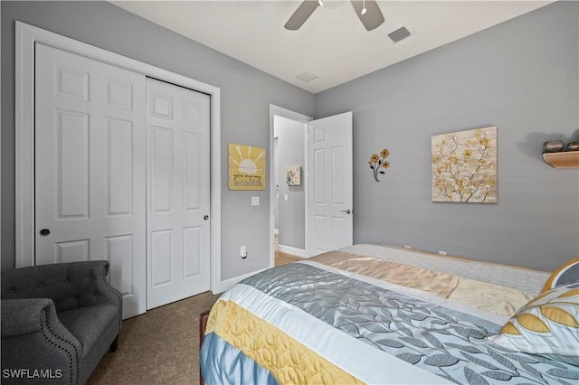 carpeted bedroom featuring baseboards, visible vents, ceiling fan, and a closet