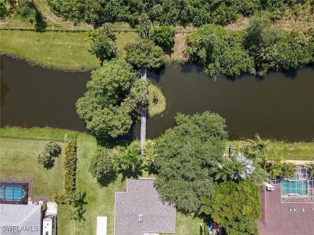 drone / aerial view with a water view