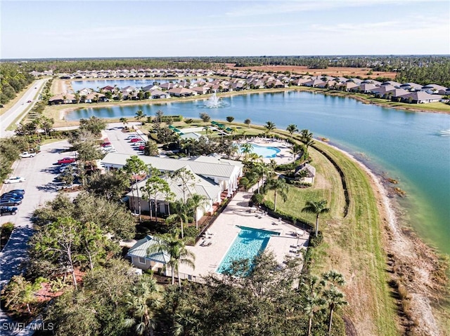 aerial view featuring a water view and a residential view