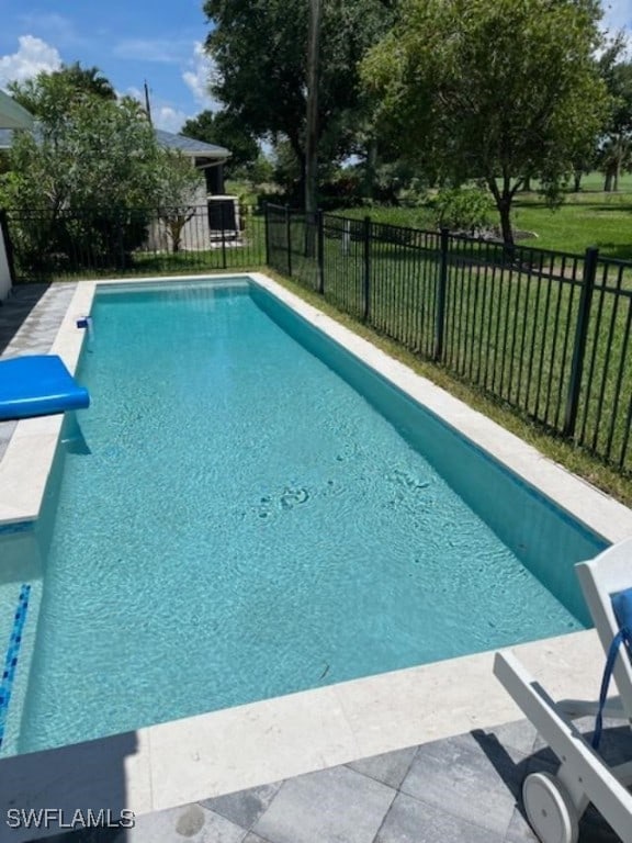 view of pool with a fenced backyard and a fenced in pool