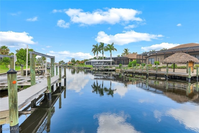 view of dock with a water view and boat lift