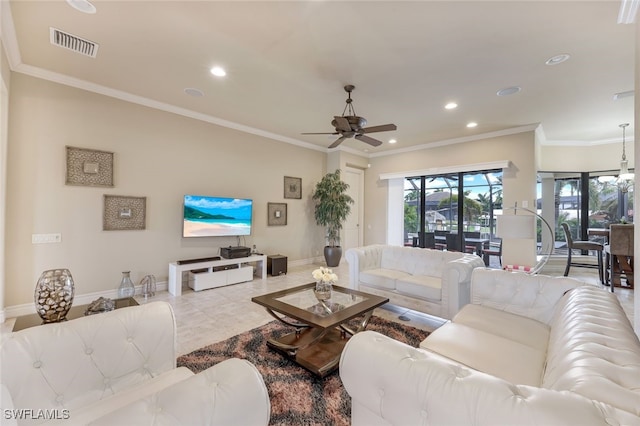 living area with recessed lighting, a ceiling fan, visible vents, baseboards, and ornamental molding